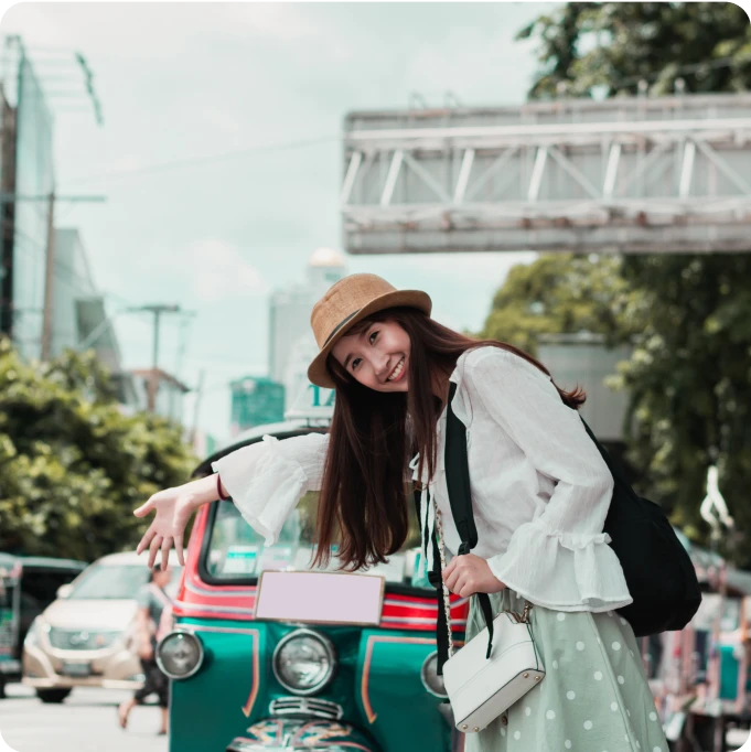 portrait_woman_standing_against_car_city_3x